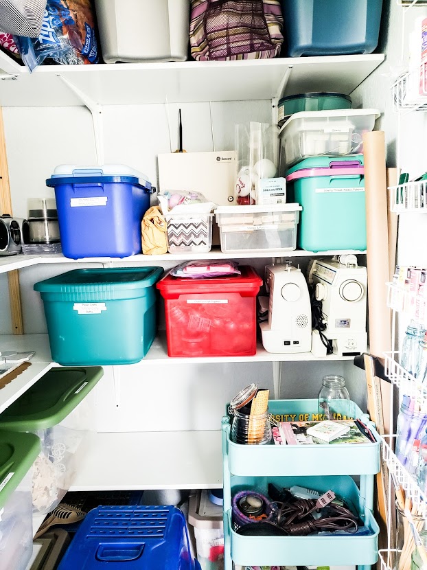 Organized-Shelves-Full-of-Bins-of Craft-Supplies