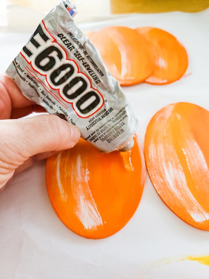 Glueing your oval to make pumpkins