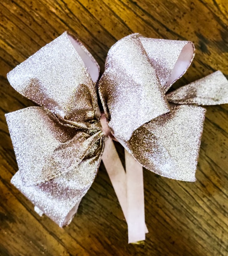 Finished bow from glitter rose gold ribbon.