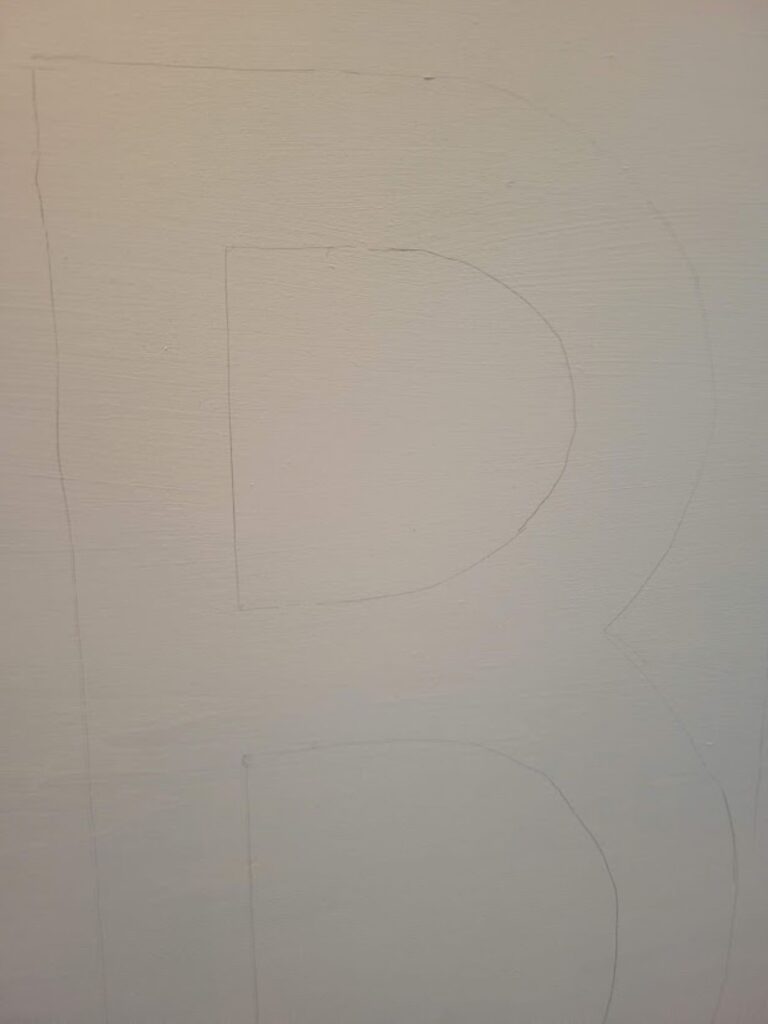 A picture of my lettering lightly drawn with a pencil