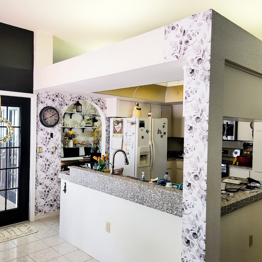 A picture of our kitchen with the new wallpaper "almost" done.