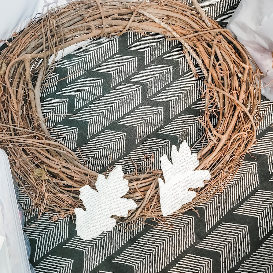 Attaching-the-book-page-leaves-to-my-grapevine-wreath