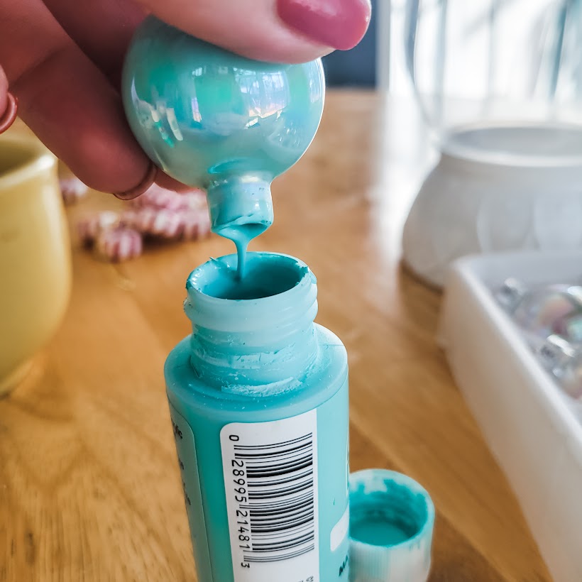 Pouring-Paint-Back-Into-Bottle