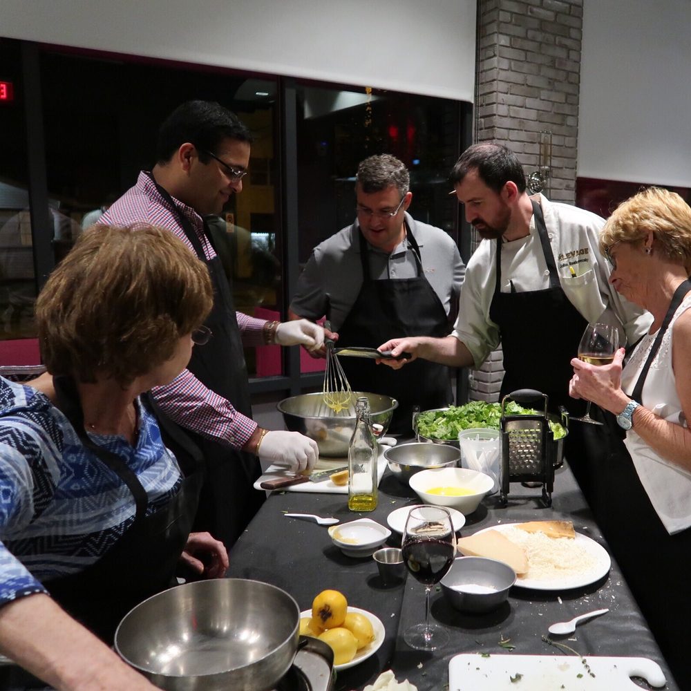 adults doing a cooking class