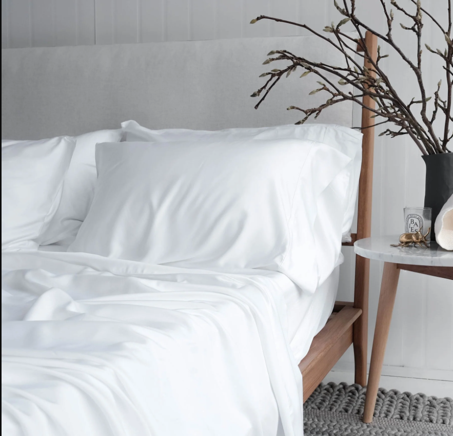 bed with white sheets