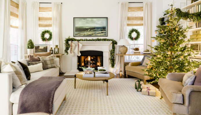 white fireplace with Christmas tree and stockings