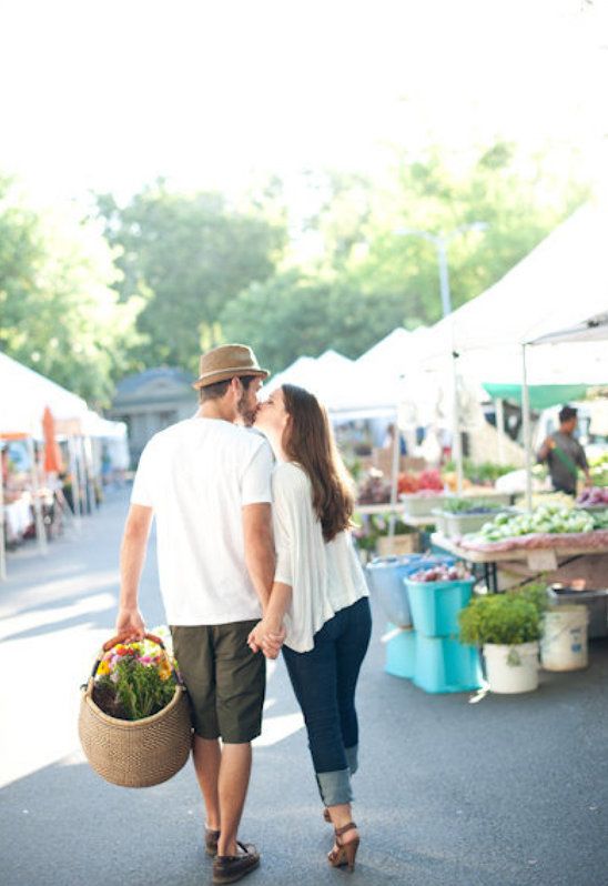 man and woman at a farmers market