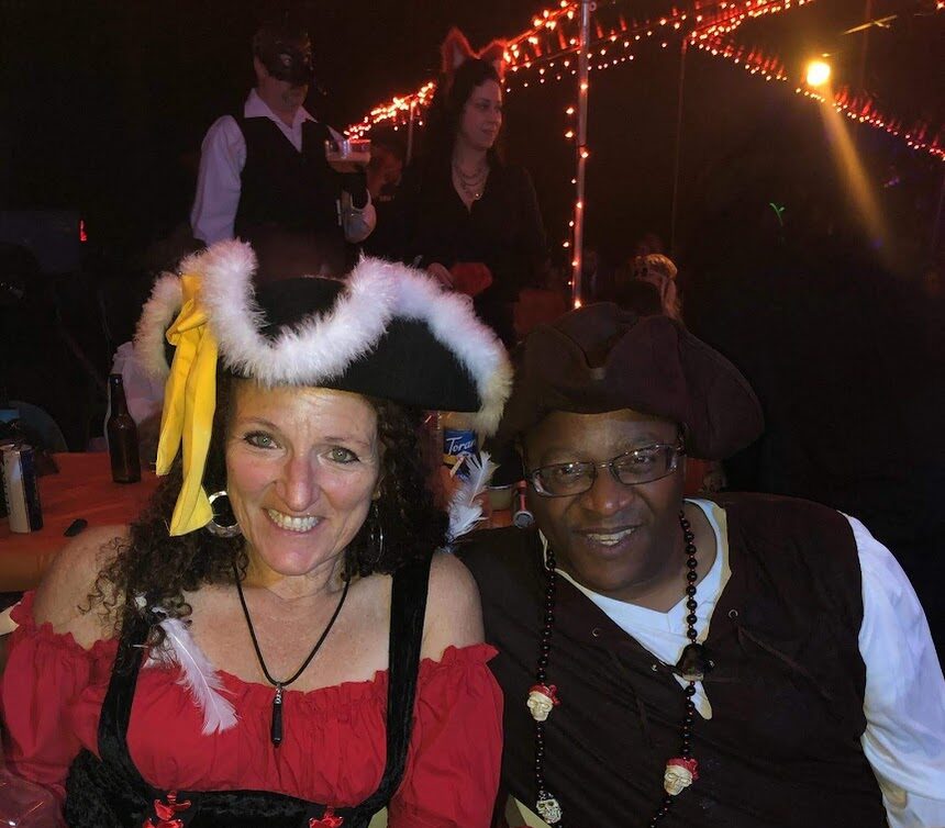 man and woman dressed as pirates