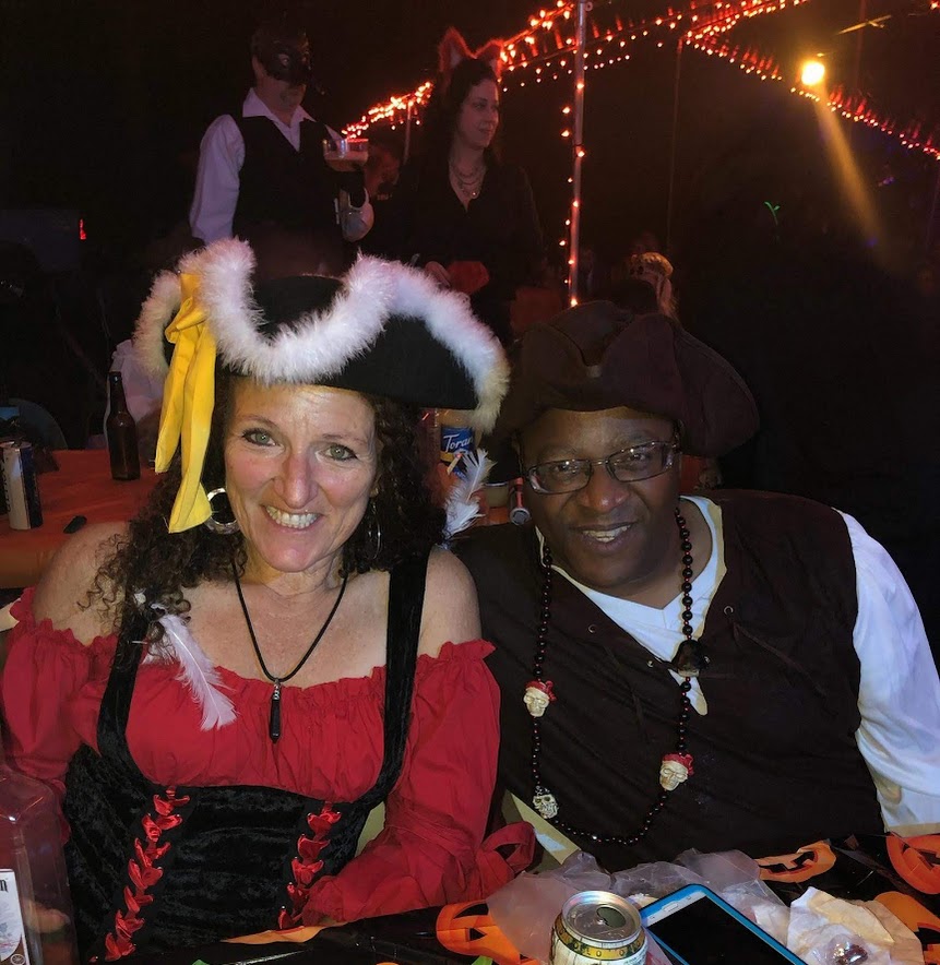man and woman dressed as pirates