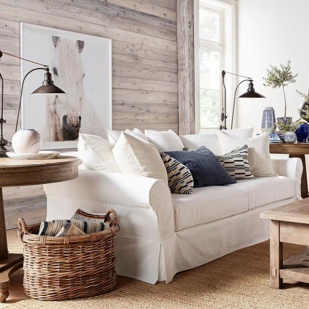 living room with white slipcovered sofa