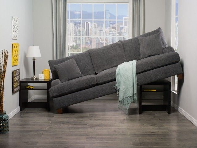 grey sofa crammed sideways in a room mistakes to avoid when buying new furniture