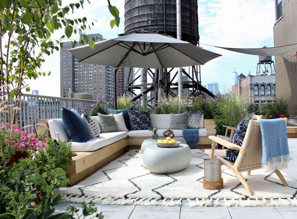 outdoor living room on a high rise in the city infusing your home with summer vibes