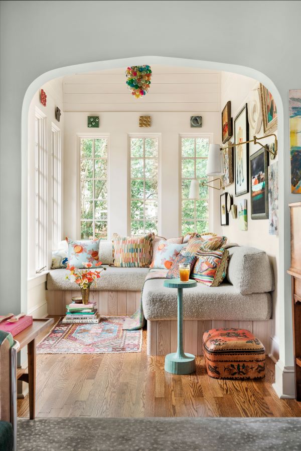 light and bright reading nook with large windows and a comfortable sofa