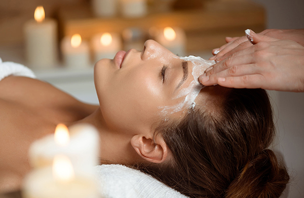 a woman getting a facial