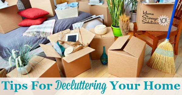 cardboard boxes filled with items in a living room