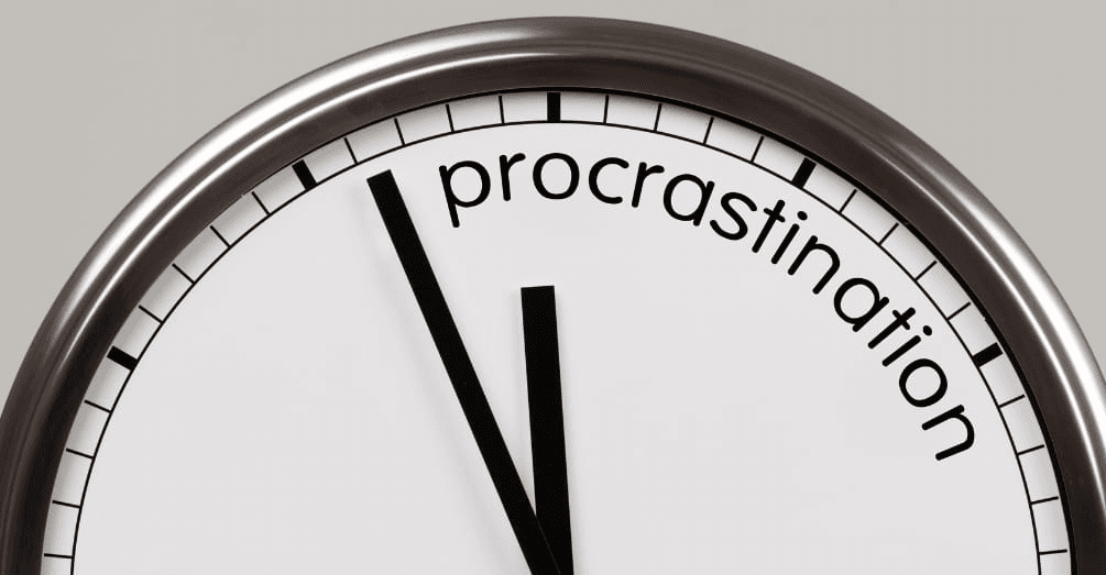 a stopwatch with the word "procrastination" written on it kick procrastination to the curb