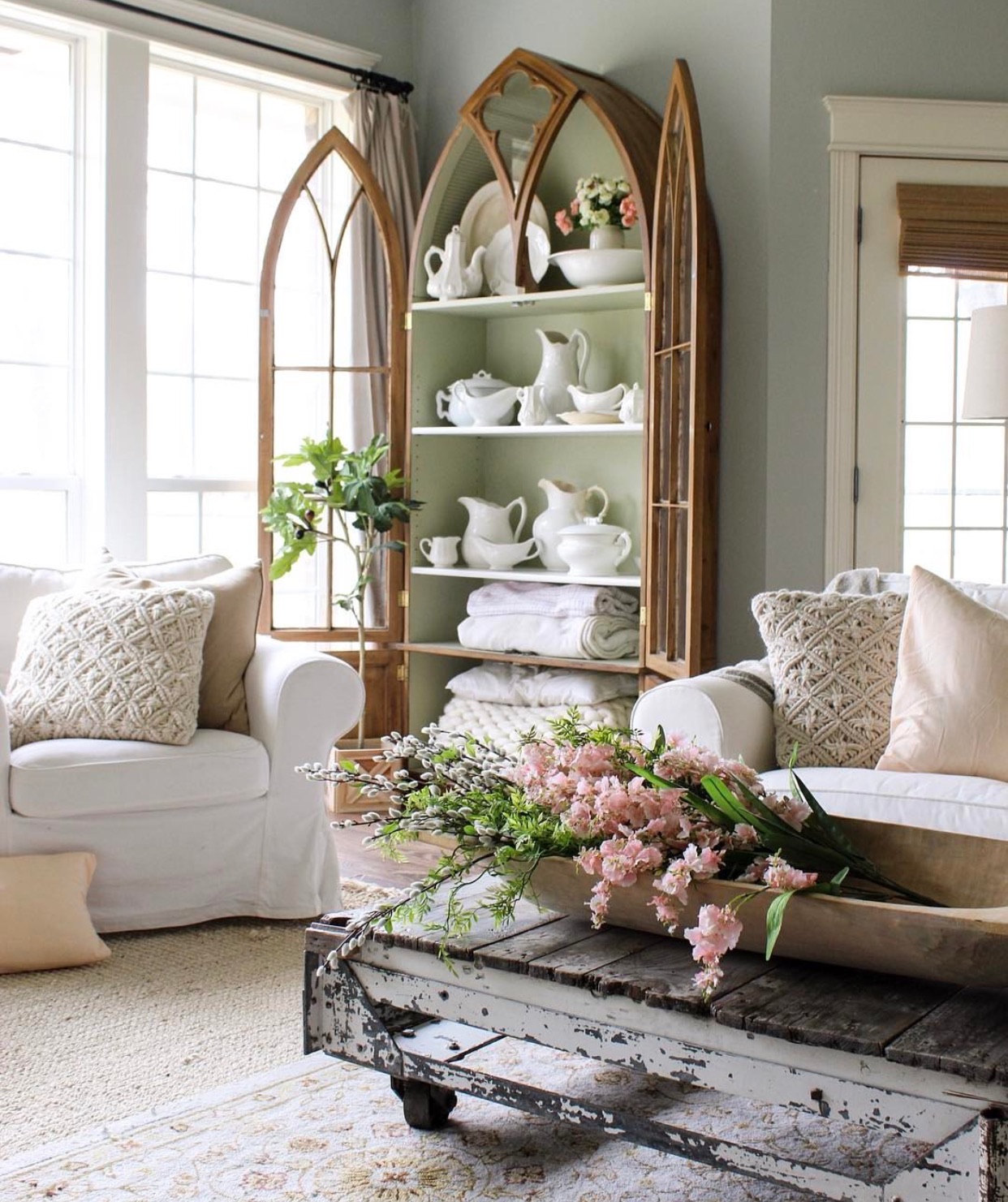 pale green living room with a hutch filled with ironstone pottery and overstuffed sofas determine your decorating style quiz