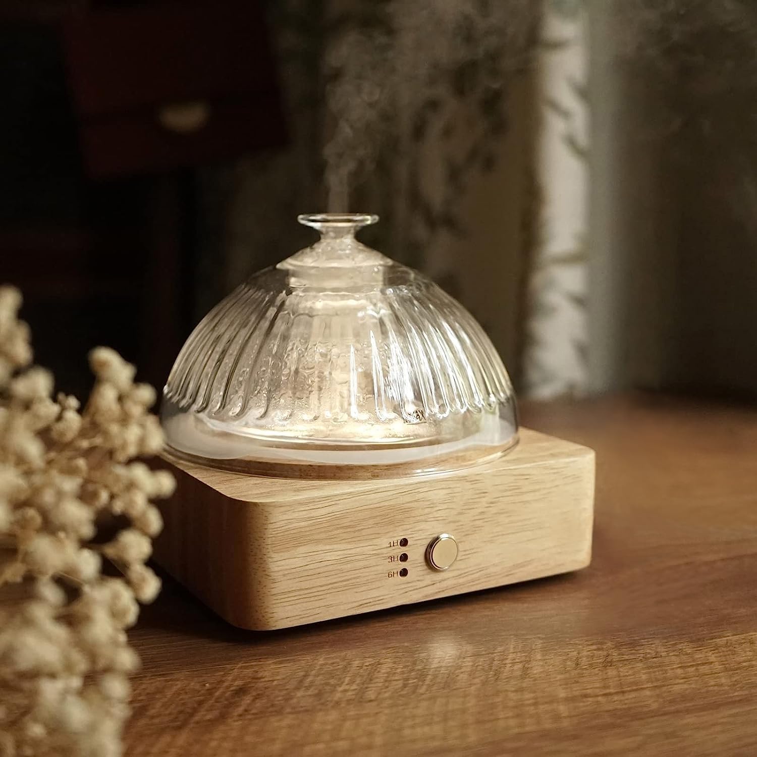 a glass dome diffuser on a wood base inspiring ways to refresh your bedroom