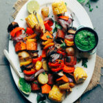 a plate of grilled veggie skewers