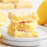 a plate of lemon coconut bars