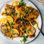 a plate of chicken piccata spring family dinners