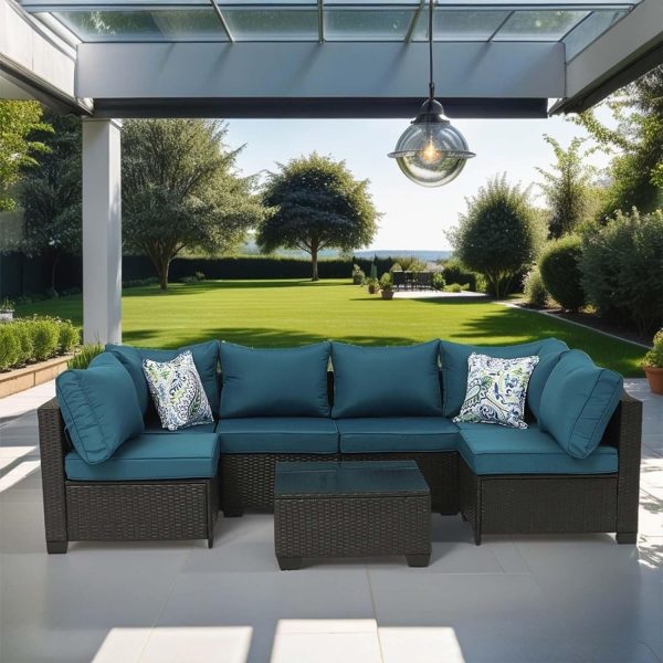 a sectional sofa under a pergola https://www.momentandco.com/the-soire/15-summer-tablescape-themes-for-your-next-dinner-party