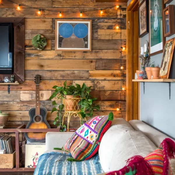 room with wood walls and string lighting