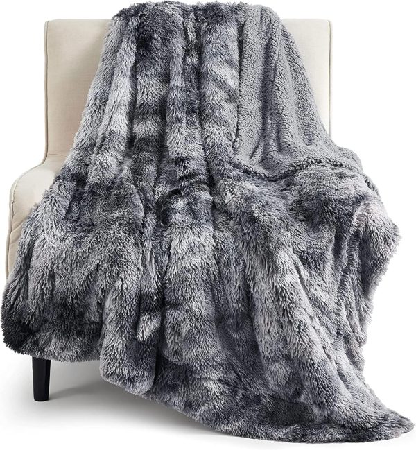 furry blanket on a white chair