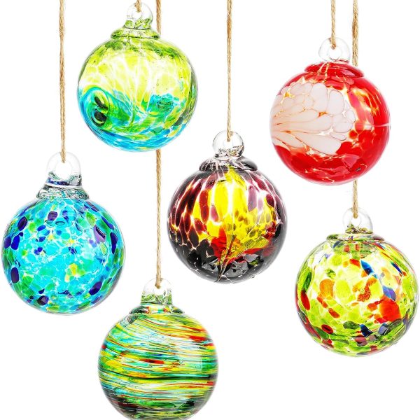 six multi-colored glass ornaments