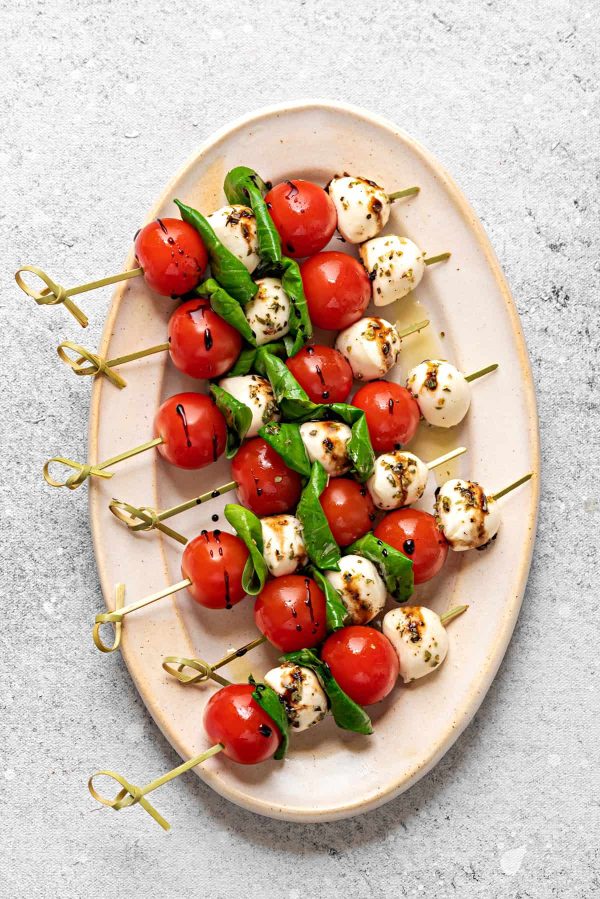 plate of caprese skewers