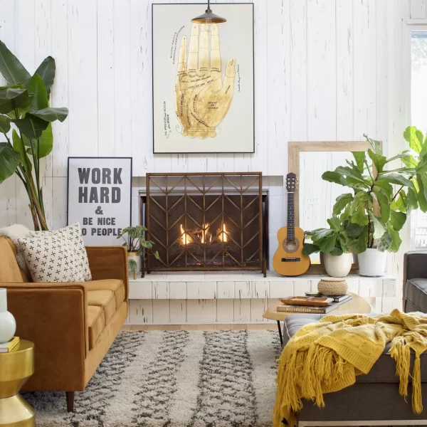 living room with lit fireplace