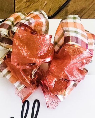 Hello Pumpkin door hanger with bow