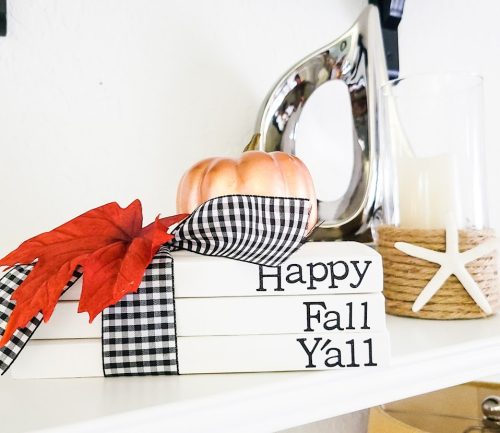 Picture of a stack of faux paperback books decorated for fall
