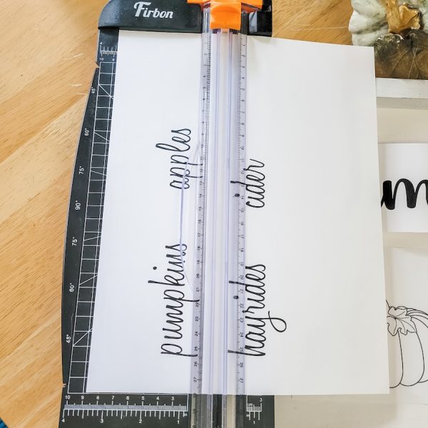printout paper with words in a paper cutter