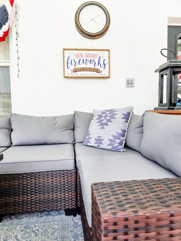 an outdoor sectional with grey cushions summer porch decor ideas