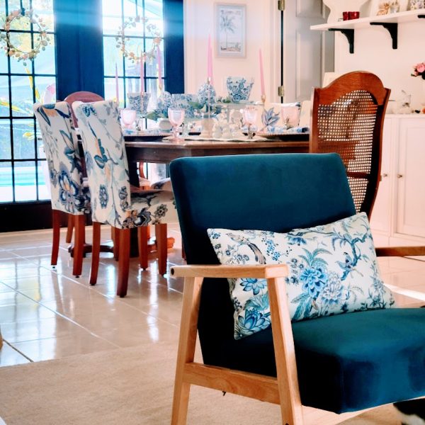 blue chair with blue and white pillow