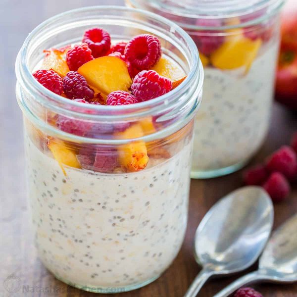 a jam jar with oatmeal and berries