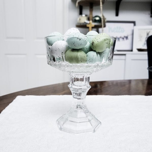 a footed candy dish on a table make these pedestal dishes for fancy feasts