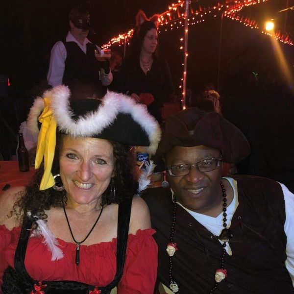 man and woman dressed as pirates