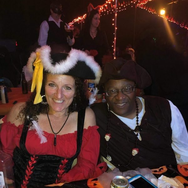 man and woman dressed as pirates