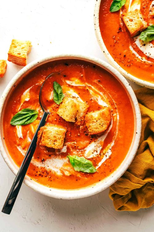 bowl of tomato soup with croutons