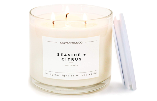 a white seaside and citrus candle
