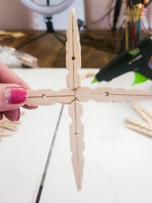 Snowflake-clothespin-Christmas-ornament-DIY-beginning-layout-glued-together