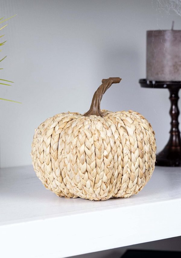 white woven pumpkin sitting on a shelf embrace fall vintage style