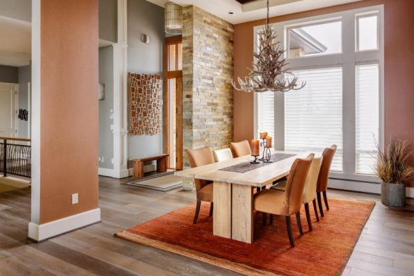 choosing the right color for your home decor Dining room with high ceilings and an antler chandelier