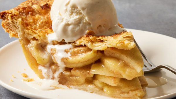 a slice of apple pie on a plate with ice cream grandma's favorite summer desserts