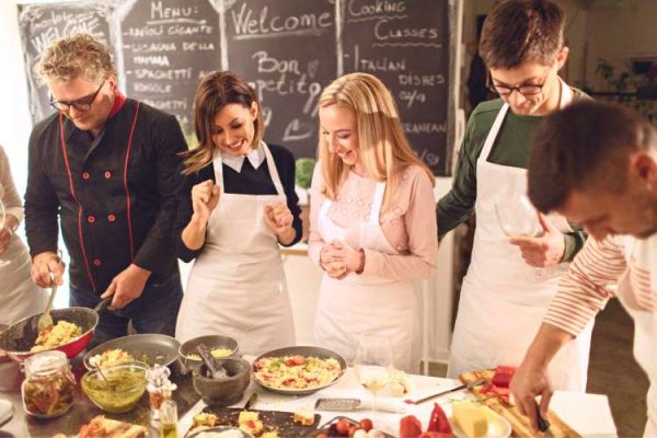 Five people cooking together the best thing to give this Christmas