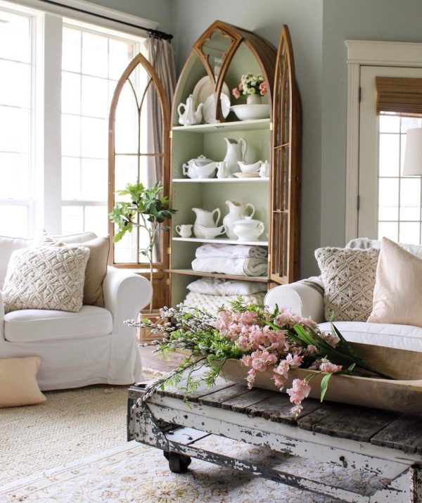 pale green living room with a hutch filled with ironstone pottery and overstuffed sofas determine your decorating style quiz