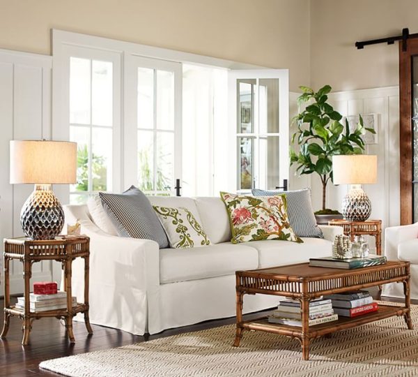 living room with white sofa and rattan coffee table timeless tips for a stylish space