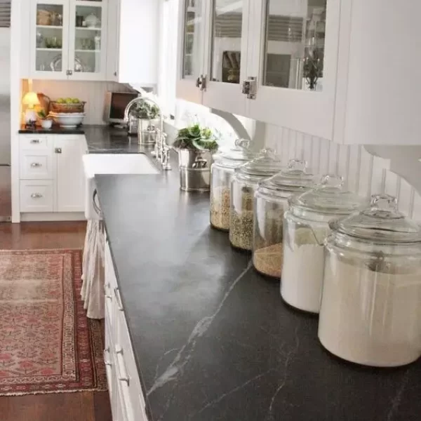 glass jars on a black countertop